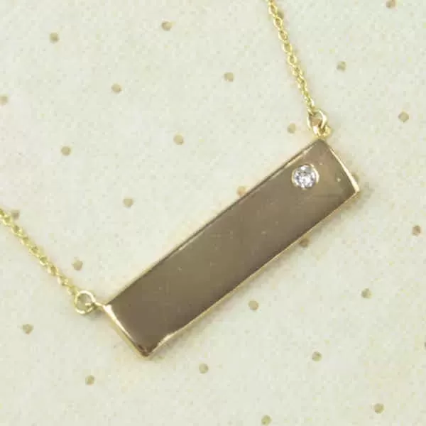Gold tone bar-style necklace