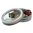 Round tin with candy