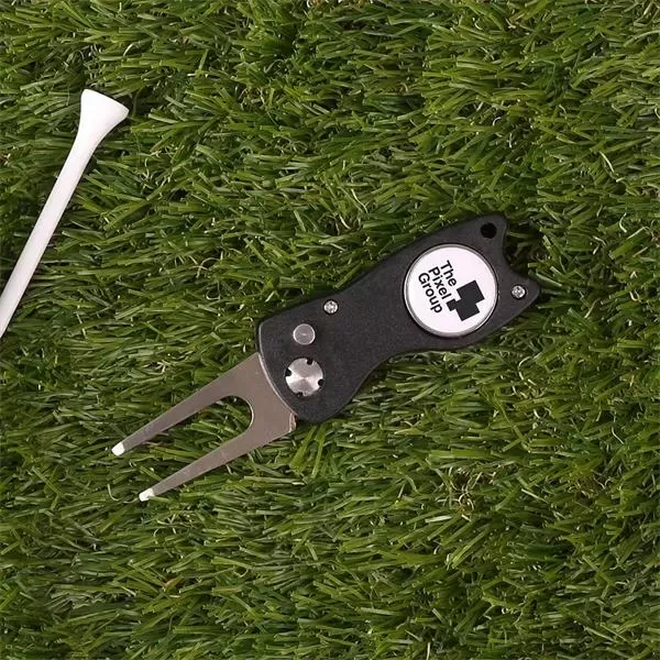 Divot repair tool with