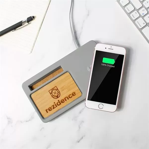 Wirelessly charges compatible smartphones.